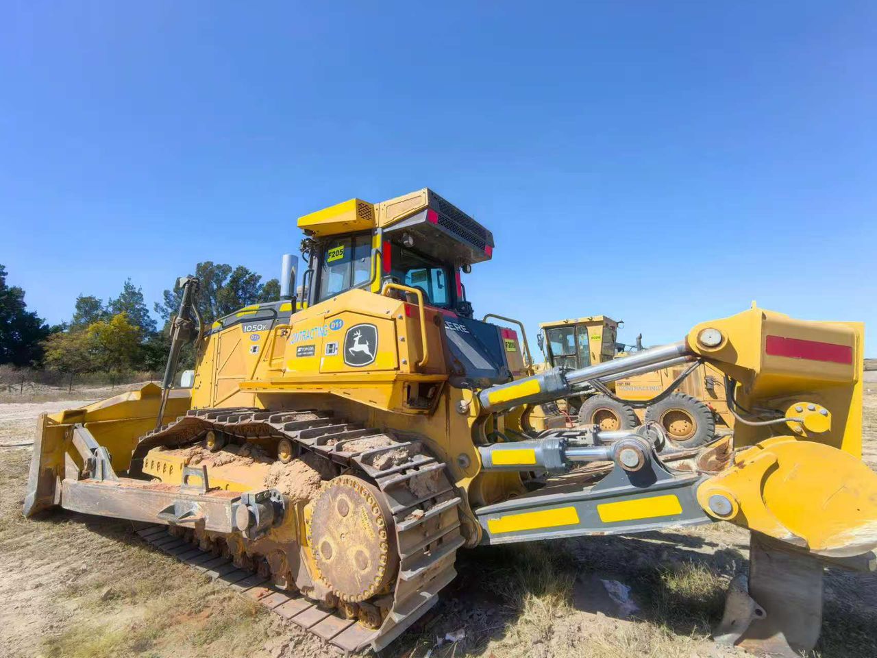 John Deere bulldozer on construction terrain
